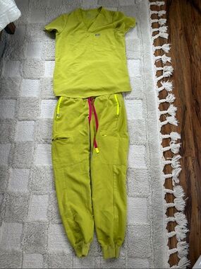 Figs Technical Collection Lime Green Scrub Top with Pink Drawstring Accent